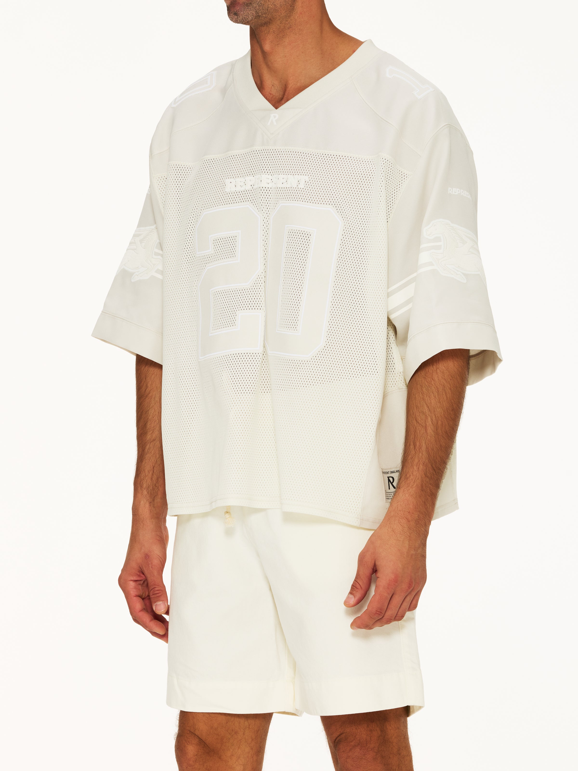 Represent American Football Top – The Shop at Equinox
