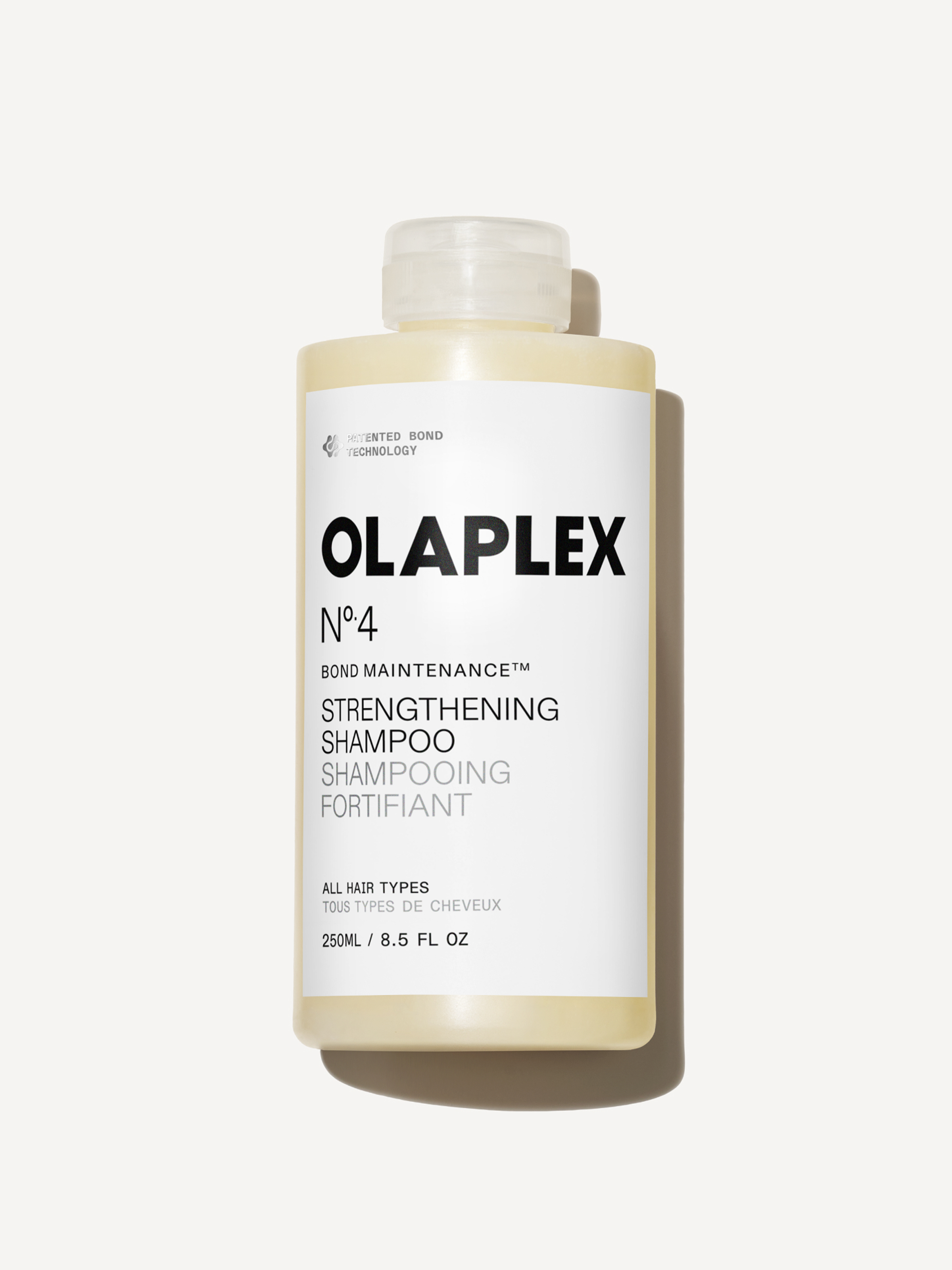 Olaplex No. 4 Blonde Enhancer Toning Shampoo – The Shop at Equinox