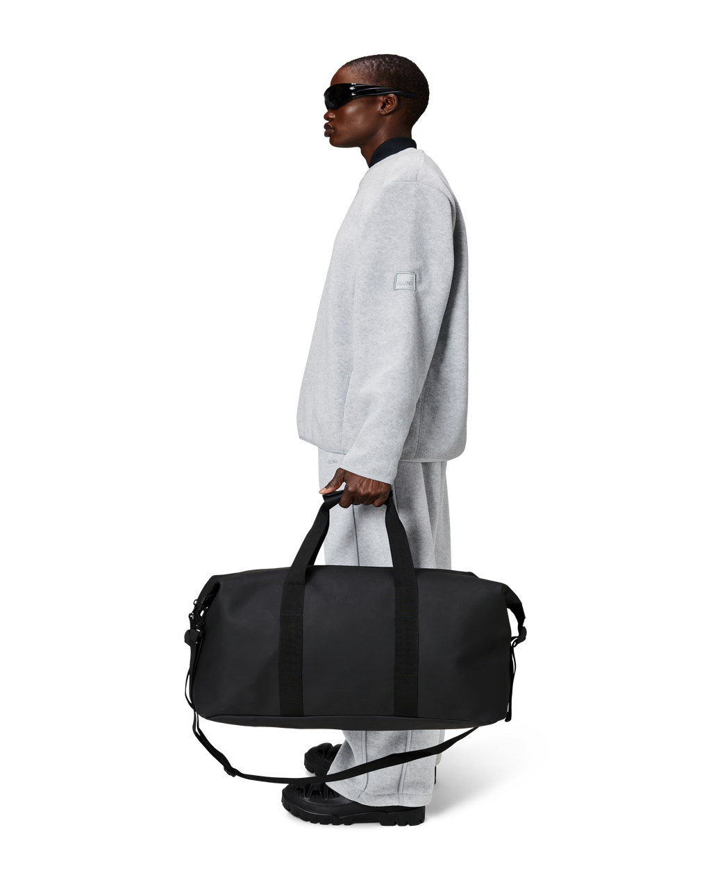 Rains® Hilo Weekend Bag in Black for $110 | Free Shipping