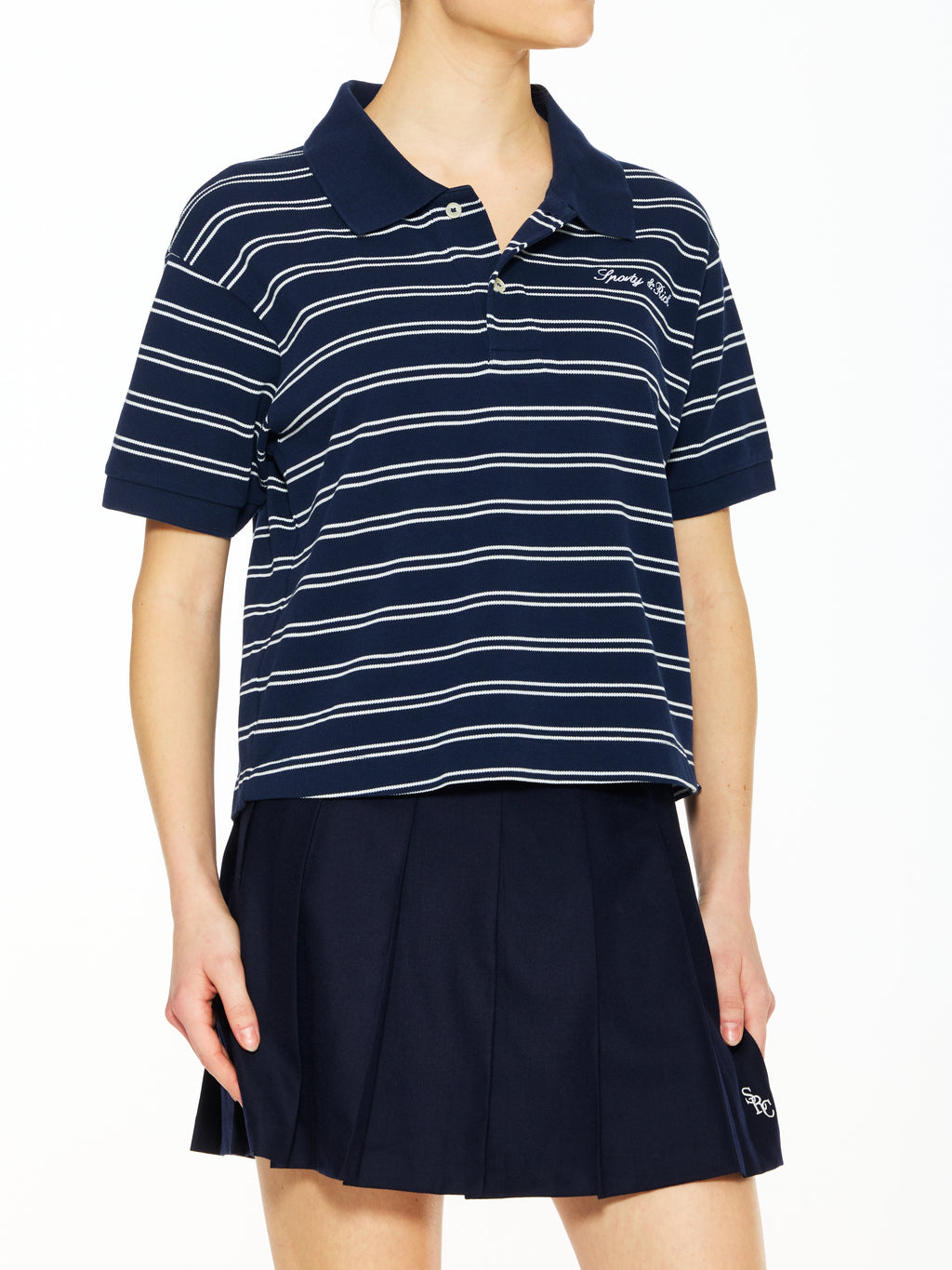 sporty & rich ×  polo tee Sporty & Rich Signature Logo Polo – The Shop at Equinox